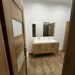 V * Holíč